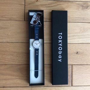 Brand new Tokyobay watch with the blue suede band.